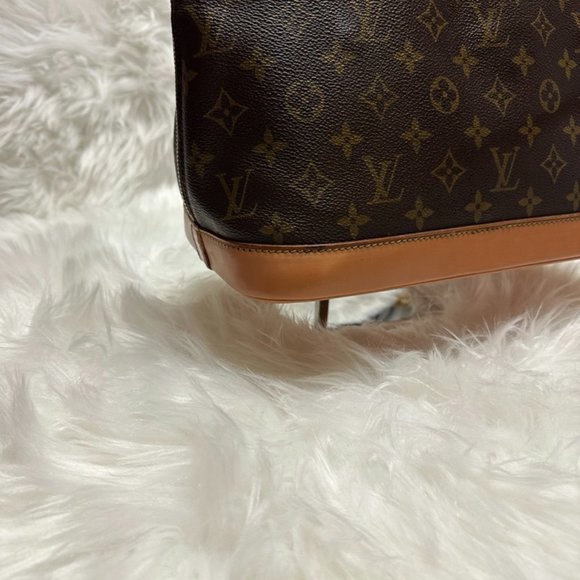 Louis Vuitton Monogram Alma Handbag - Picture 7 of 16
